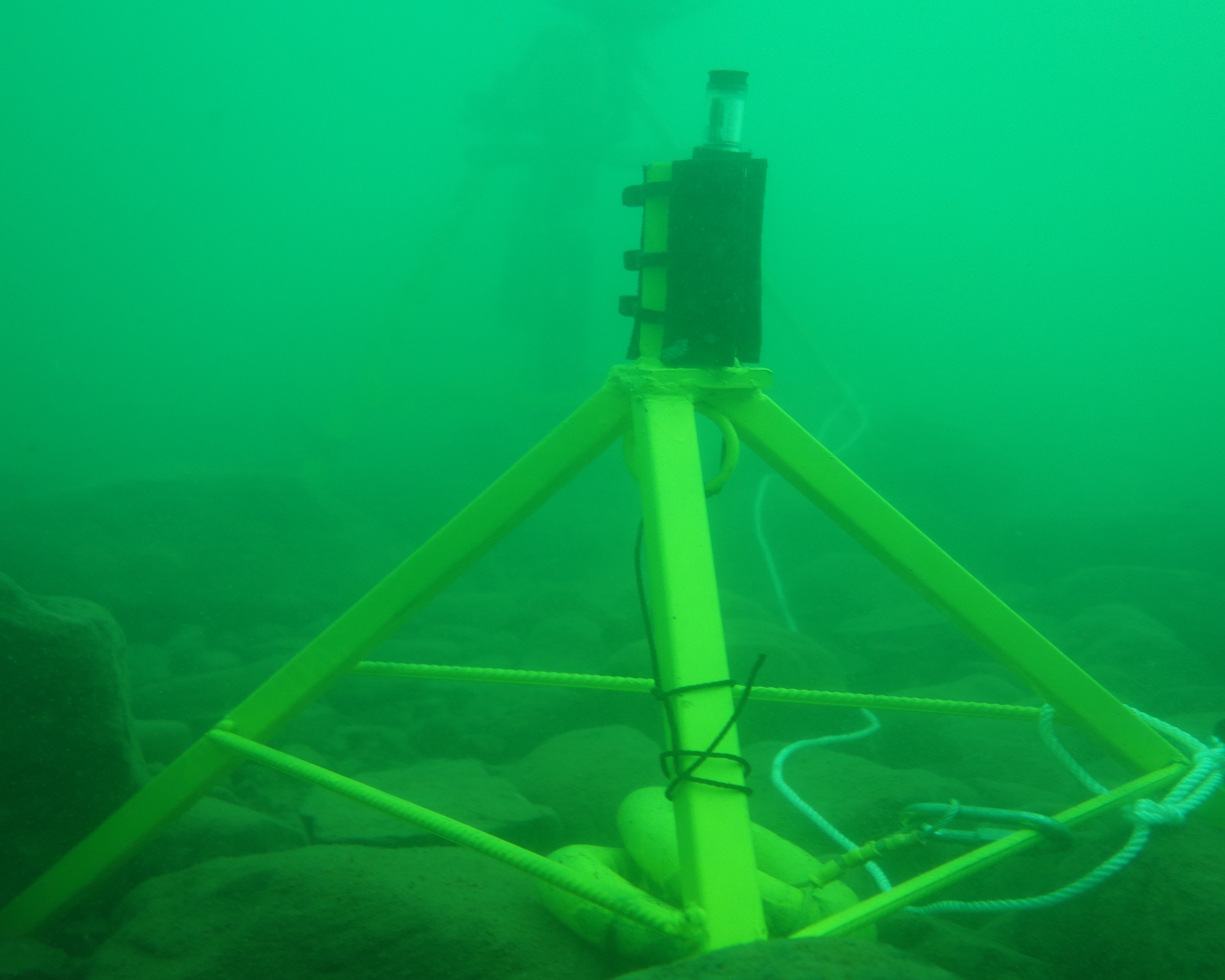 Under-ice light sensor deployment off Sand Island, Lake Superior